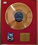 Gold Disc awarded to Stuart Tosh for Bloody Tourists