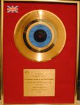 Gold Disc awarded to Stuart Tosh for Dreadlock Holiday